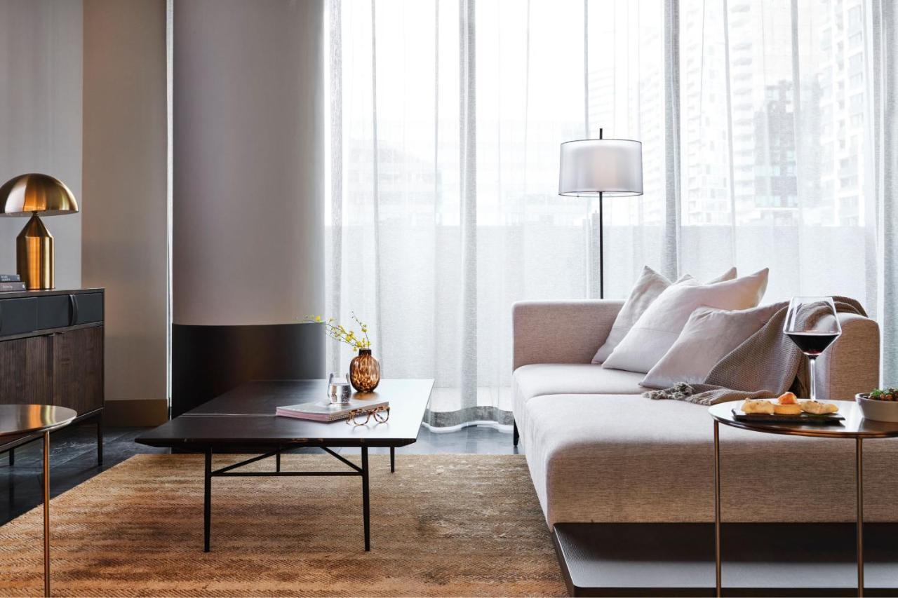 Melbourne Marriott Hotel Docklands Экстерьер фото A living room in a private house