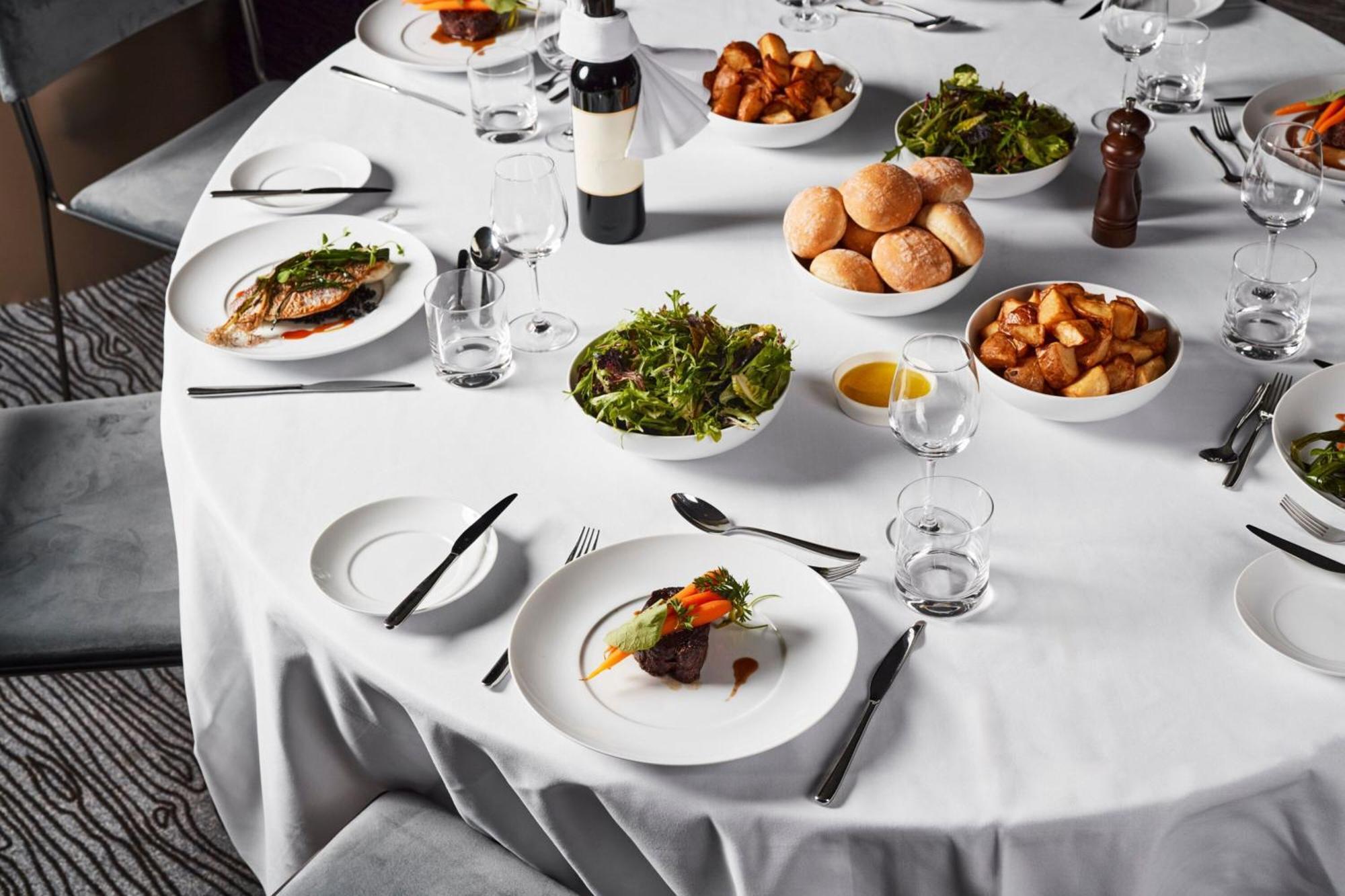 Melbourne Marriott Hotel Docklands Экстерьер фото A table set for a formal dinner
